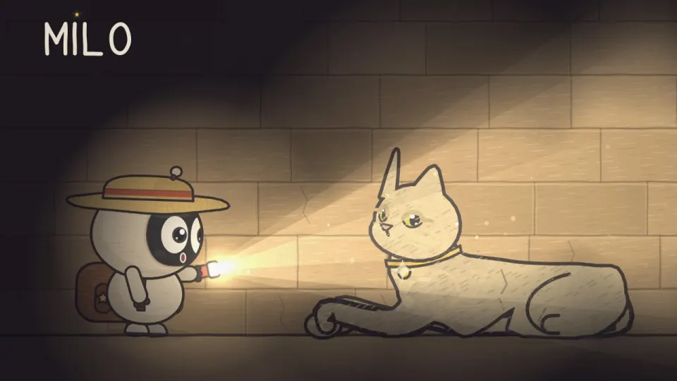 Milo çölde bir kedi heykeline bakıyor